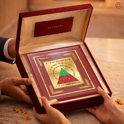 Vahan Durghtna Yantra displayed in a decorative frame on a wooden table, symbolizing planetary energies.