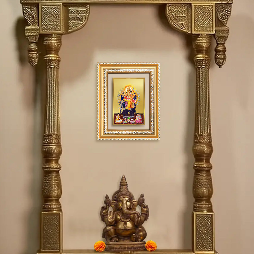 Lord Vishwakarma photo frame in 24k gold plated foil displayed on wall