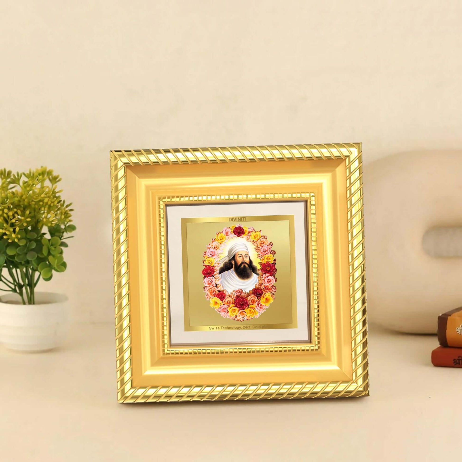 Zoroaster Tabletop Frame in 24K Gold Plated Foil surrounded by flowers, representing righteousness and divine wisdom.