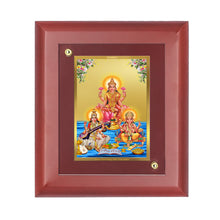 Load image into Gallery viewer, DIVINITI Lakshmi Ganesha Saraswati Gold Plated Wall Photo Frame, Table Decor| MDF 2 Wooden Wall Photo Frame and 24K Gold Plated Foil| Religious Photo Frame For Pooja, Gifts Items (20.0CMX16.0CM)
